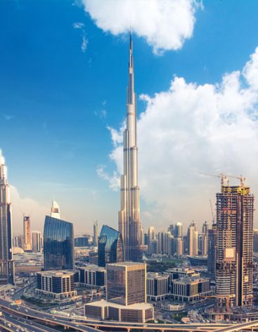 dubai-skyline-evening_114775-22